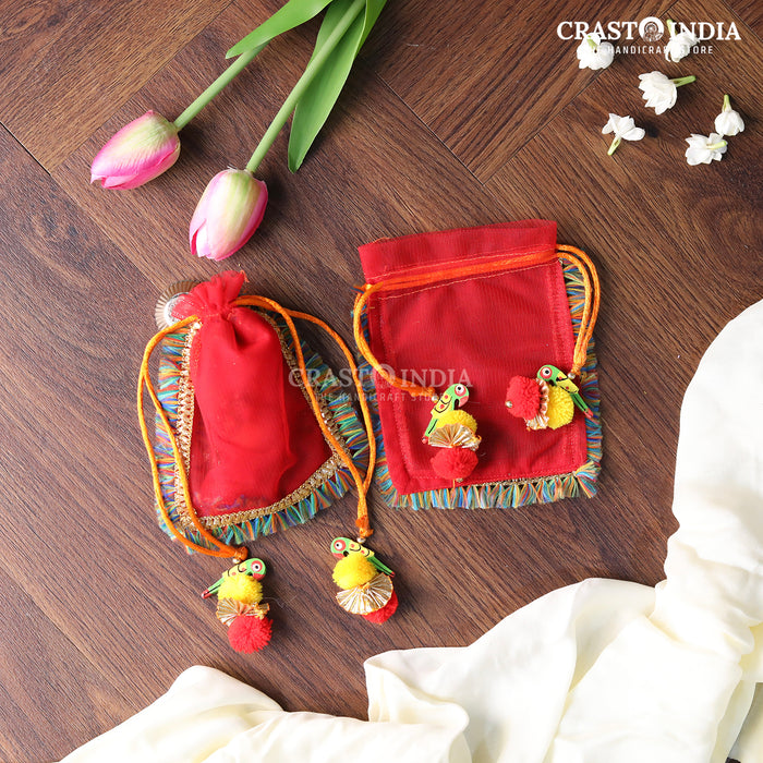 CRASTO INDIA HANDCRAFTED CLOTH POTLI WITH PARROT POM-POM LATKAN - RED ( AVAILABLE IN 4 SIZES)