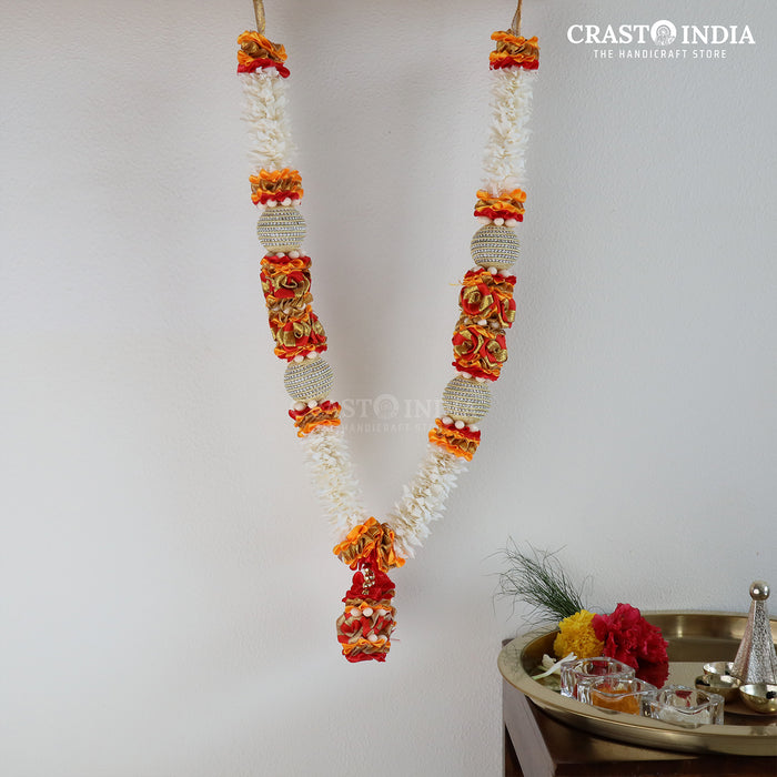 CRASTO INDIA HANDCRAFTED RIBBON GARLAND WITH CHAIN BALL AND ROSES. (AVAILABLE IN 2 COLOURS)